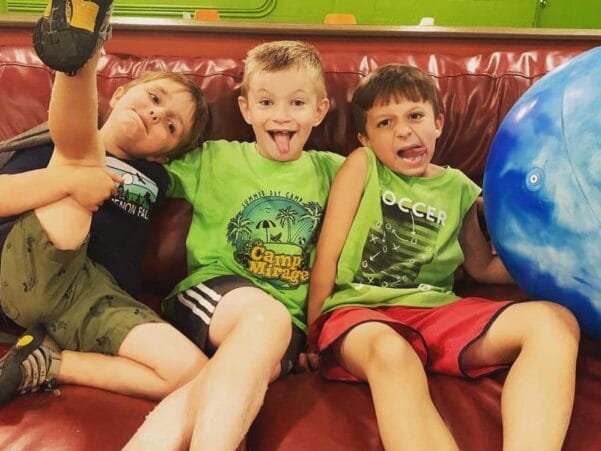 boys hanging out at camp mirage dude camp