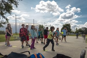 kids playing pickleball at camo